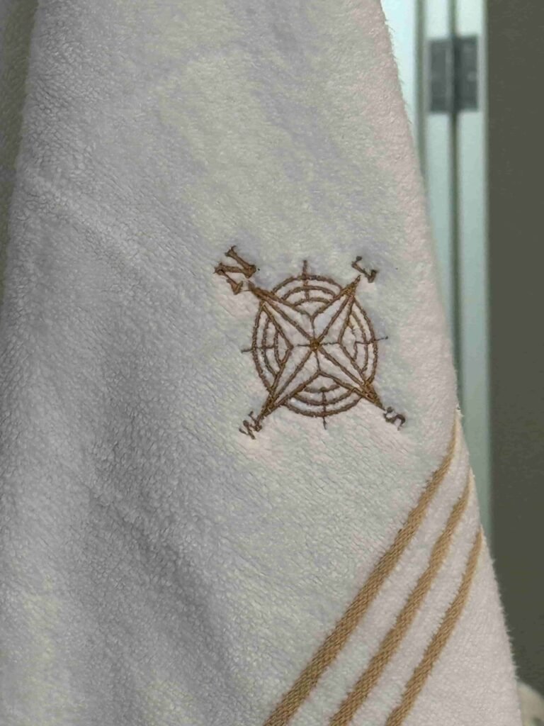 Toalla Brújula (manos)